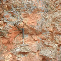 Diamante 2. Arroyo Cañada del Oro. Argillized, hematite-goethite in andesite.